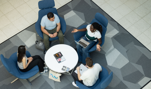 Students sit in a group at LMU